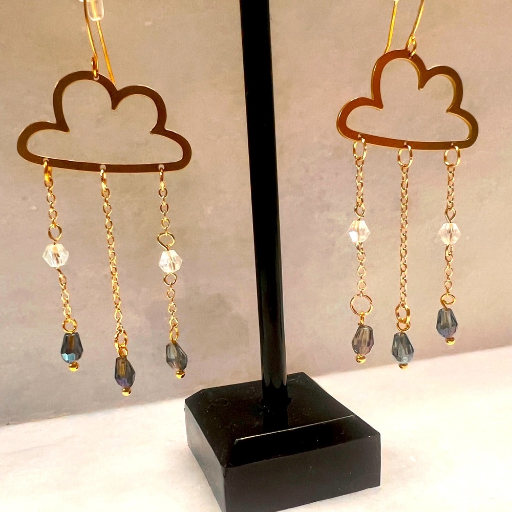 Purple, rain, brass, and gold handmade earrings. Brighten your day with these.💜